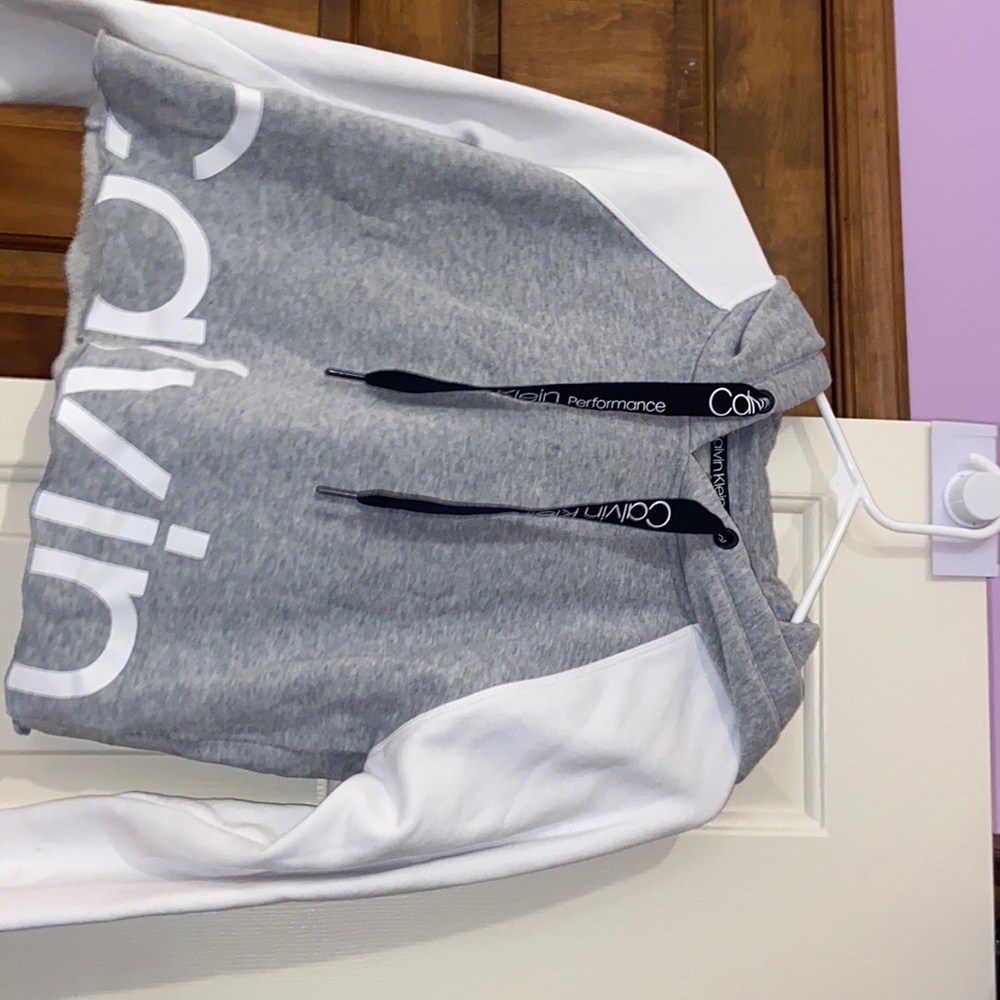 Calvin Klein Sweatshirt, grey and white, barley worn.